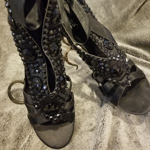 Elegant studded black heel